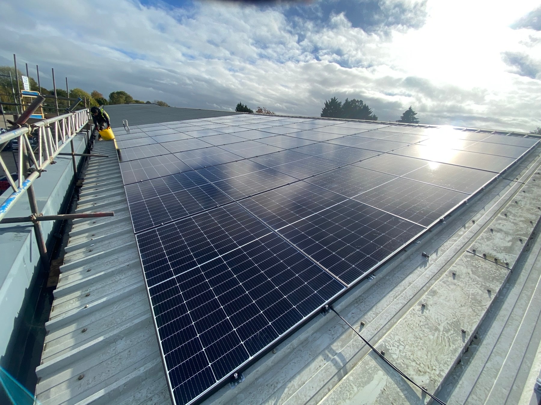Large commercial solar PV array on an industrial roof